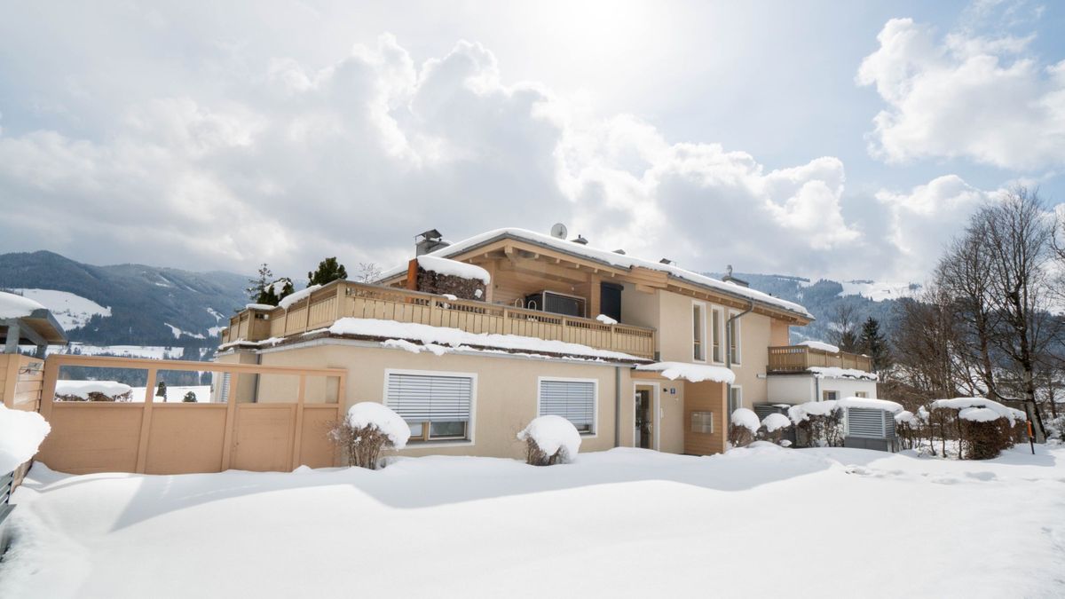 Apartment Jessica in Leogang mit verschneiter Winterlandschaft